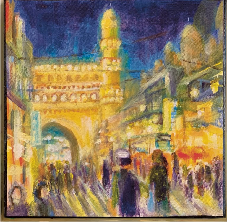 Brightly lit shops next to Charminar at Hyderabad with crowds of shoppers