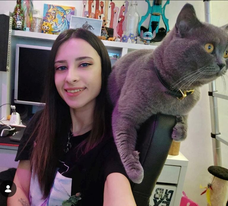 Raly Yoncheva, creator of Pawsonalities, with her British Shorthair cat