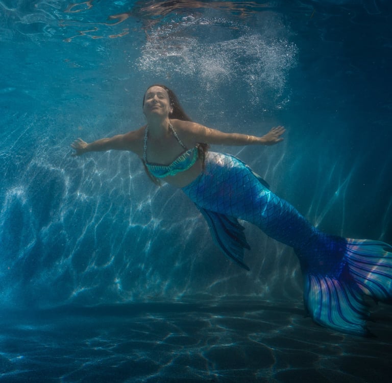 Professional Mermaid in a pool
