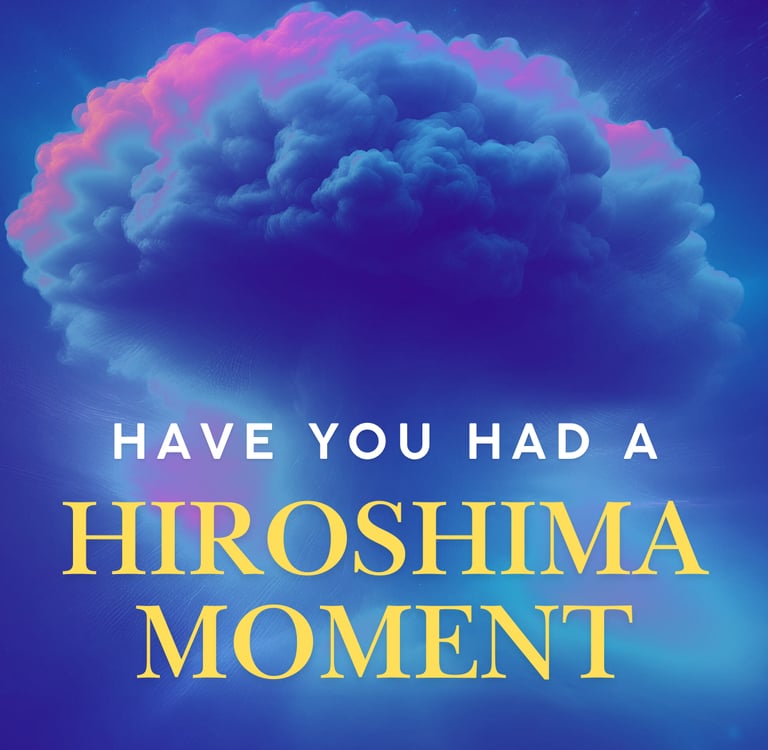 Hiroshima Moment text over a big fluffy mushroom cloud from atomic bomb