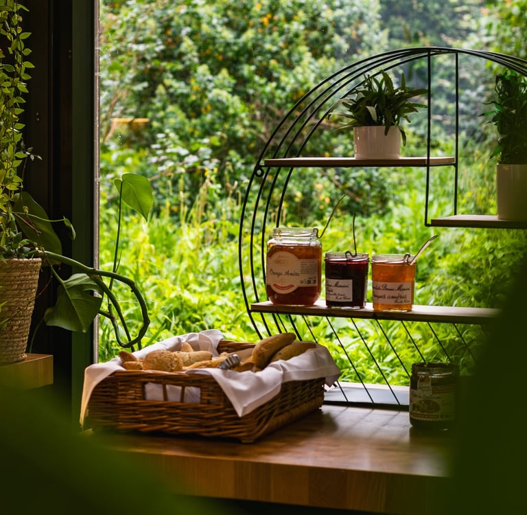a table with a basket of food and a basket of food