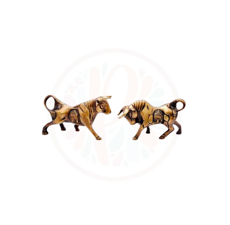 two wooden sculptures of a bull and a tiger