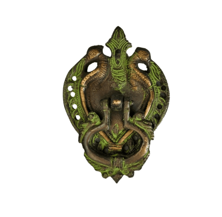 a metal wall mounted with a green dragonfly