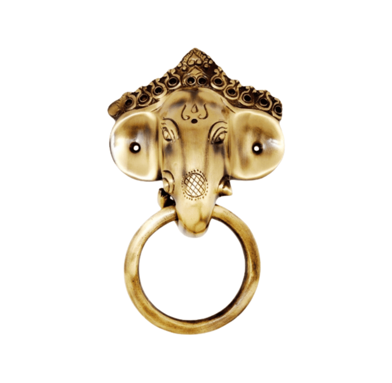 a gold ring with a head of an elephant