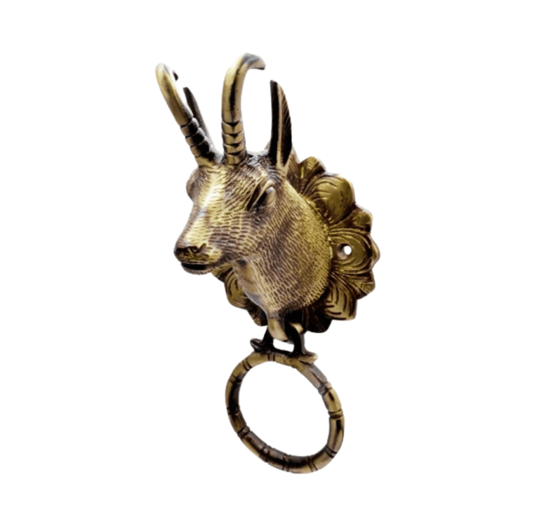 a goat head with a ring on it's ring