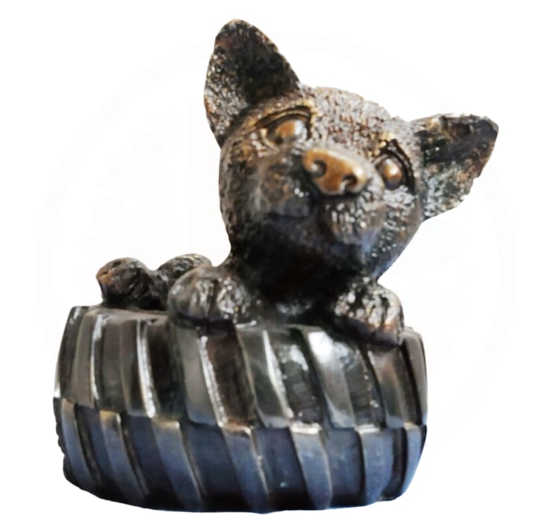 Brass Puppy seated in tyre Statue