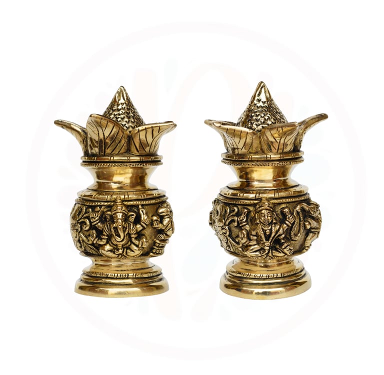 a pair of brass - plated candlesticks