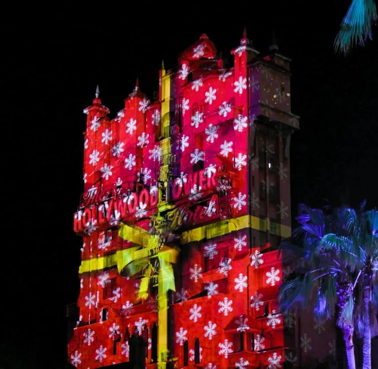 Sunset Seasons Greetings (Hollywood Studios) - Hollywood Tower Tower Hotel with Holiday gift wrap overlay