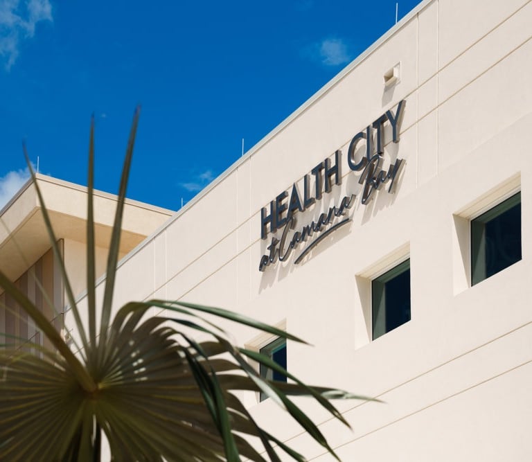 Health City Hospital, Cayman—modern state-of-the-art medical facility exterior with adv achitecture