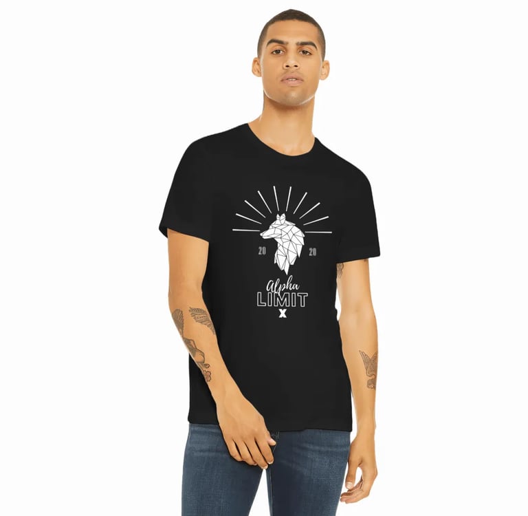 a man wearing a black t - shirt with a white wolf head