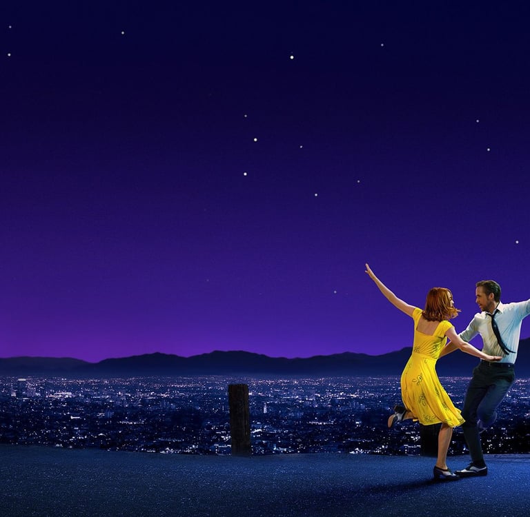 Stone and Gosling dance in silhouette against a city skyline in La La Land (2016)