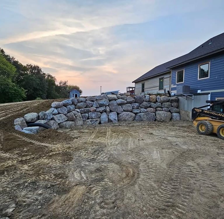 Boulder wall at residential home in Cokato MN