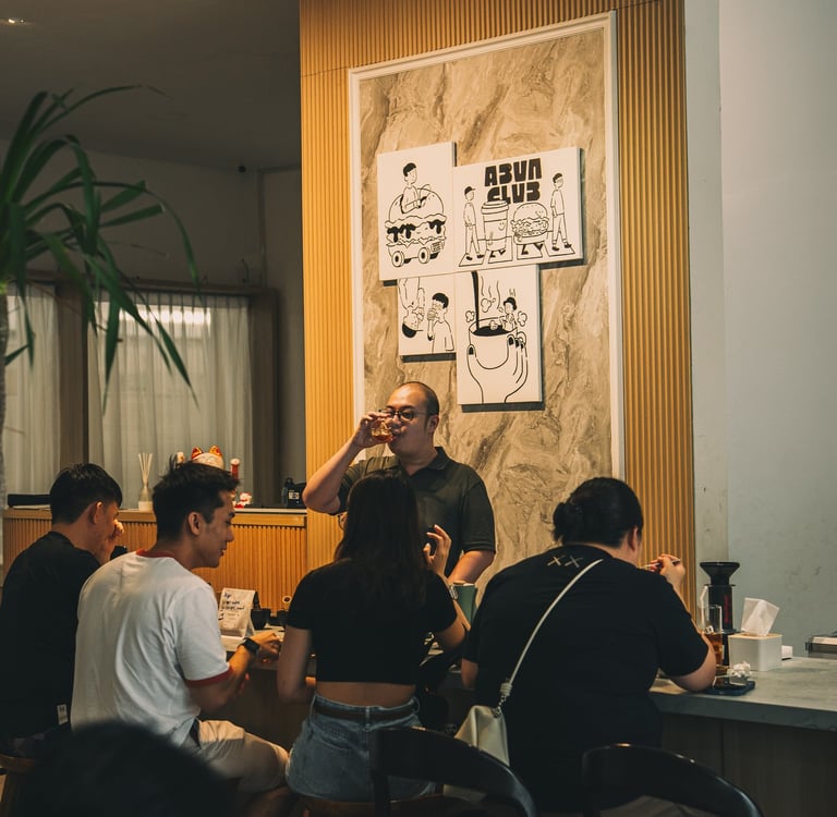 Crowds having conversation over coffee at Abun Club Batam