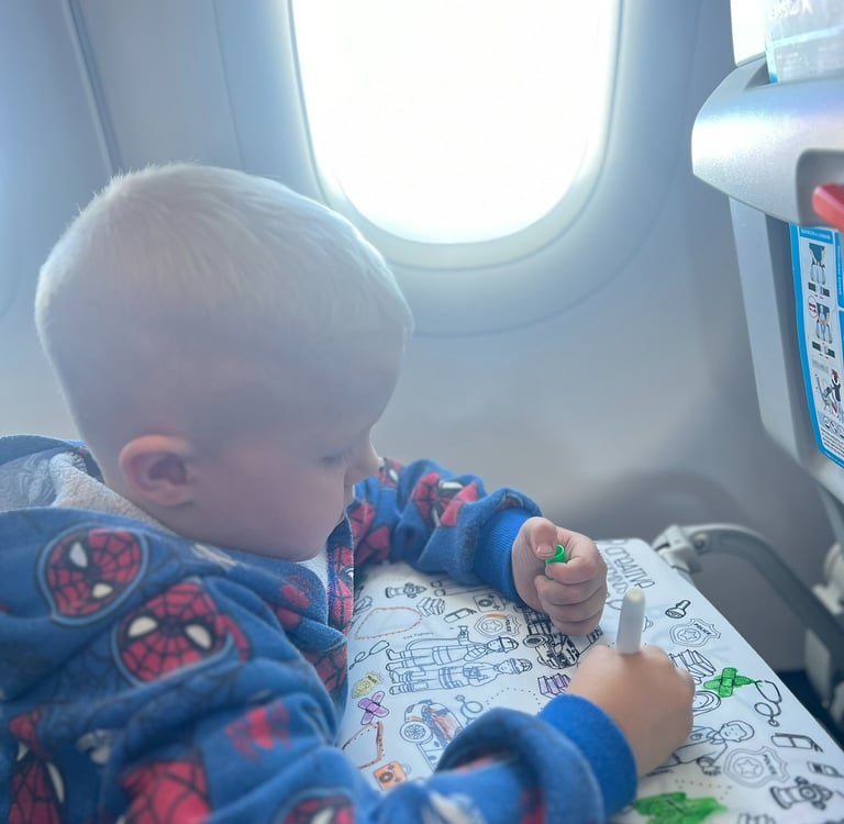 Scribbly Kids reusable drawing mats packed in travel tubes for on-the-go quiet play