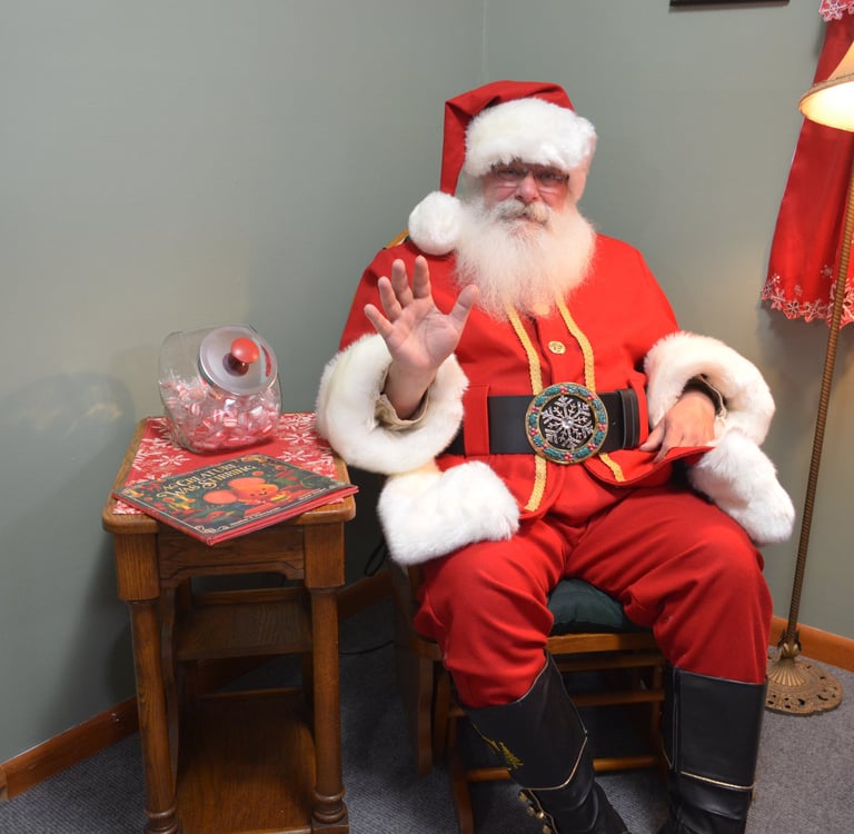 Santa Tom waning and seated for e Central Missouri Christmas event