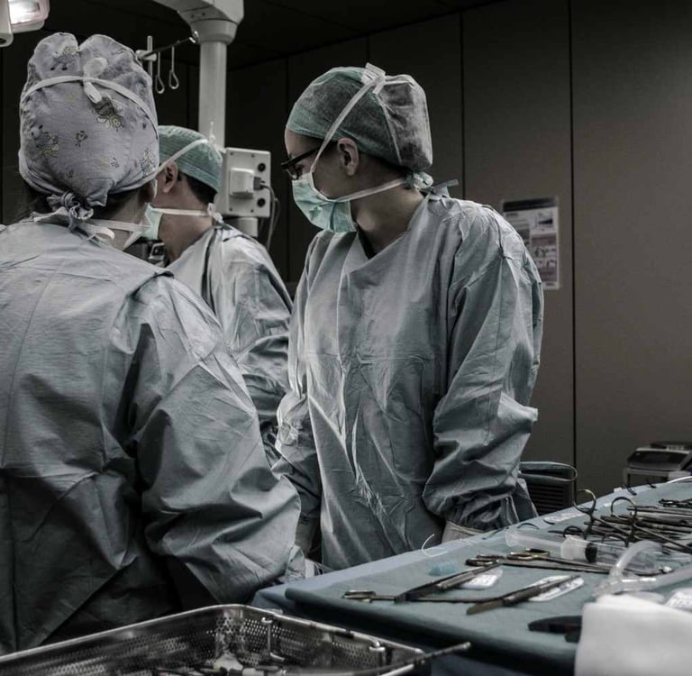 Board-certified plastic surgeon consulting with a patient at a modern Boise Idaho cosmetic surgery practice