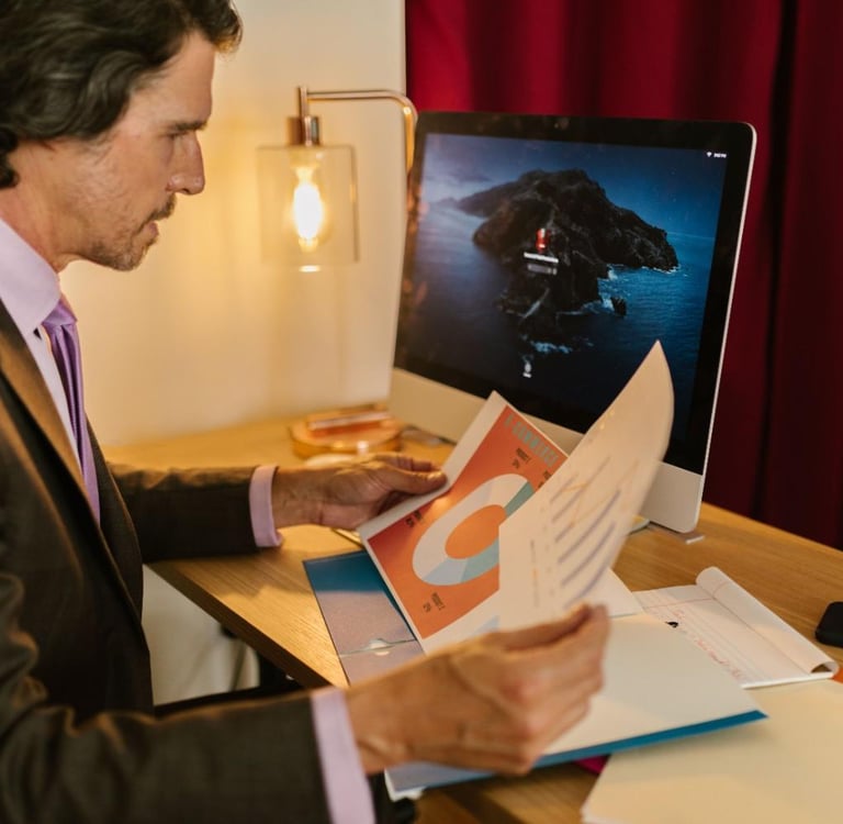 Colorado Springs business owner reviewing SEO agency proposals to find the best SEO company