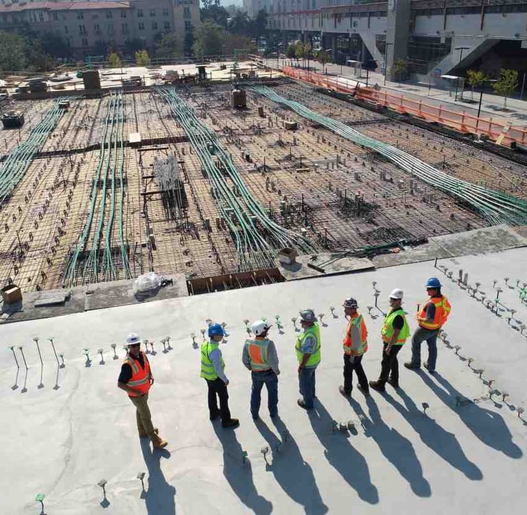 General contractor reviewing construction plans at an active commercial build site in Columbus Ohio
