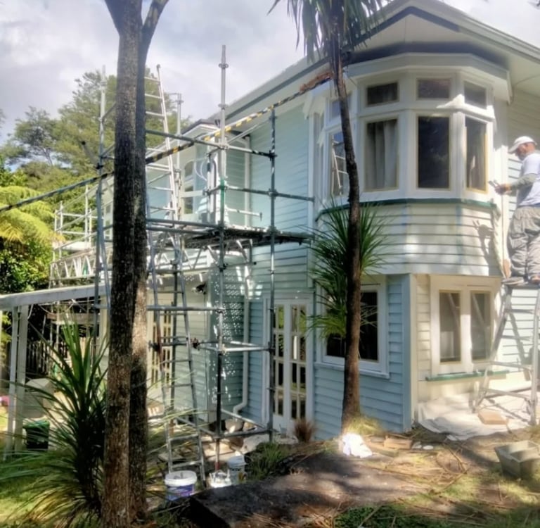 Painting bungalow with scaffolding - Precision Painting