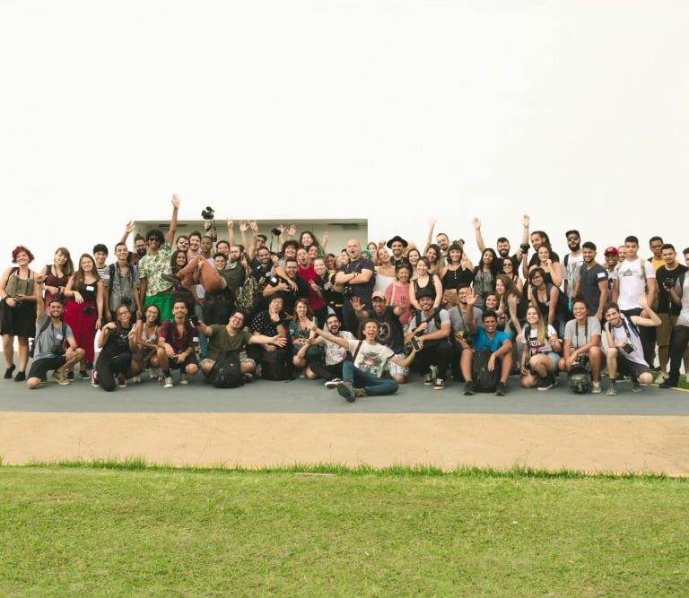a group of people standing in front of a building