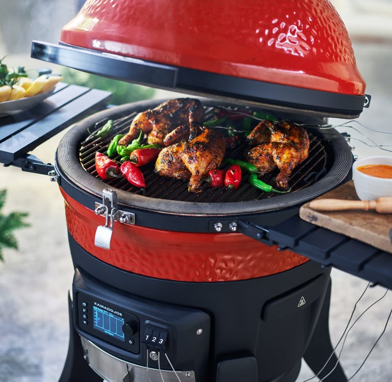 Kamado Joe Ceramic BBQ grill with chicken