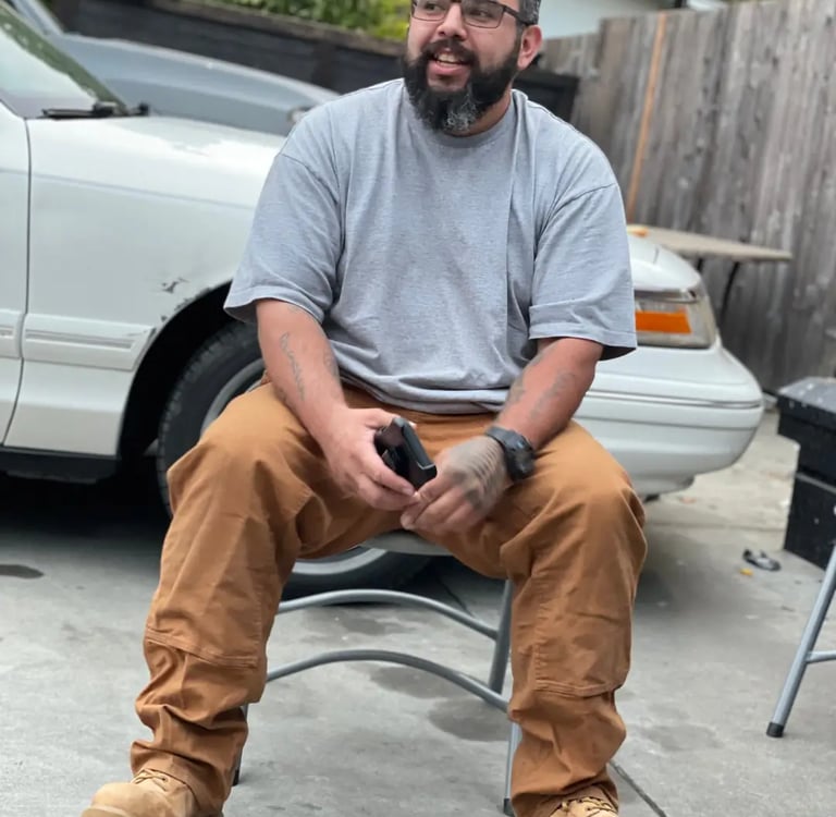 Sonoma Junkers co owner Luis sitting on a chair