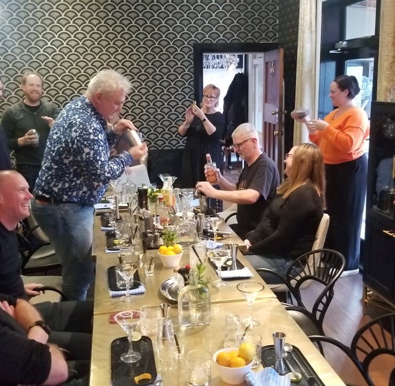 Group of coworkers enjoying a fun Cocktail class together at Tonic Bar & Bistro