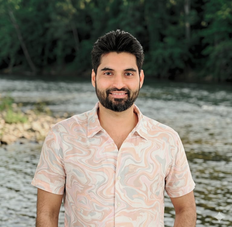 Rohan Fernandes, relationship and intimacy coach at Turtle Balance, smiling in the nature.
