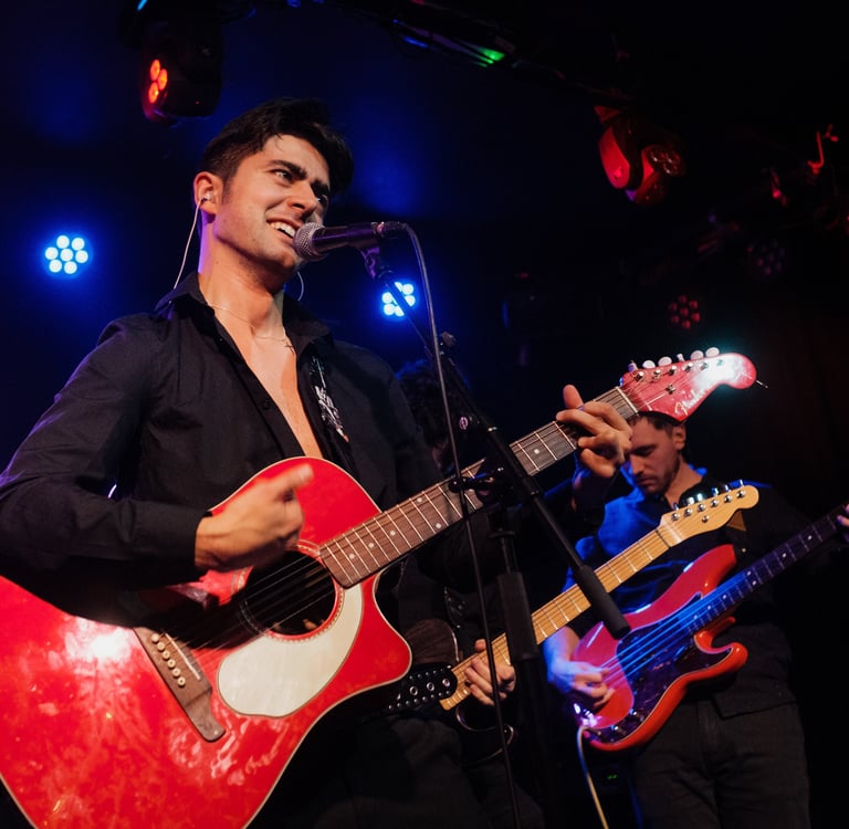 Brighton UK wedding and events singer Olly Williams performing live with guitar