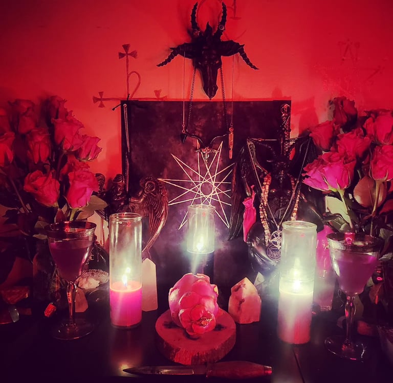 Satanic altar with Baphomet sigil, red roses, lit ritual candles, and occult symbolism under red light.