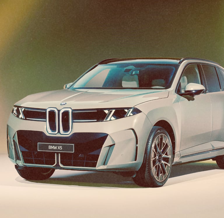 A silver BMW X5 luxury SUV concept featuring a modern front grille and sleek headlights.