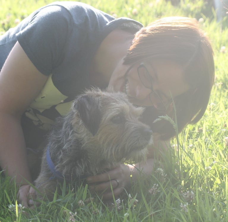 Suzanne from Bark and Ride with her Border Terrier, Stan