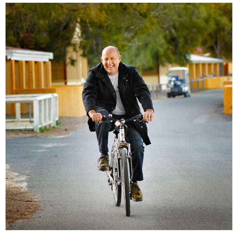 Geoff Fisher riding a bike at Rottnest