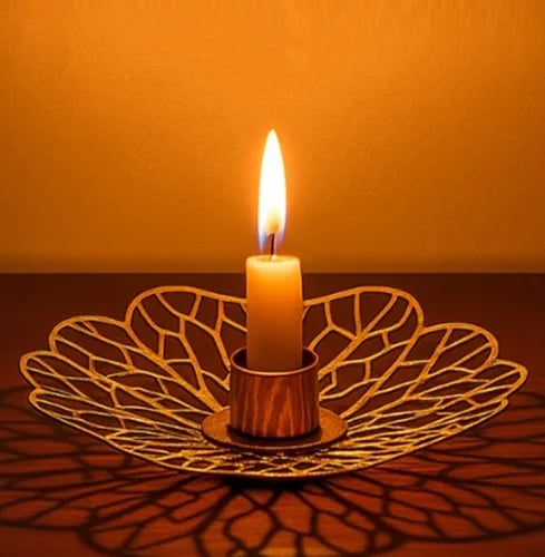 Flower shaped brass candle stand