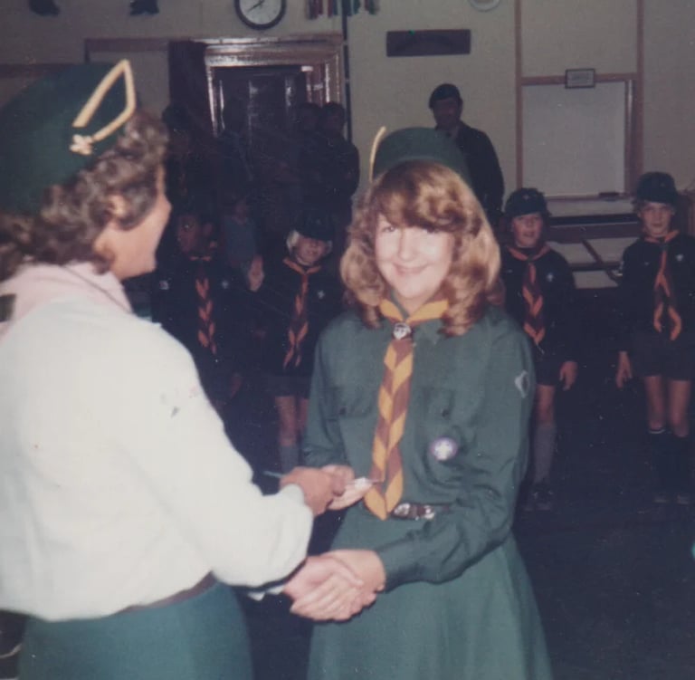 cub and scouts leaders in a hut