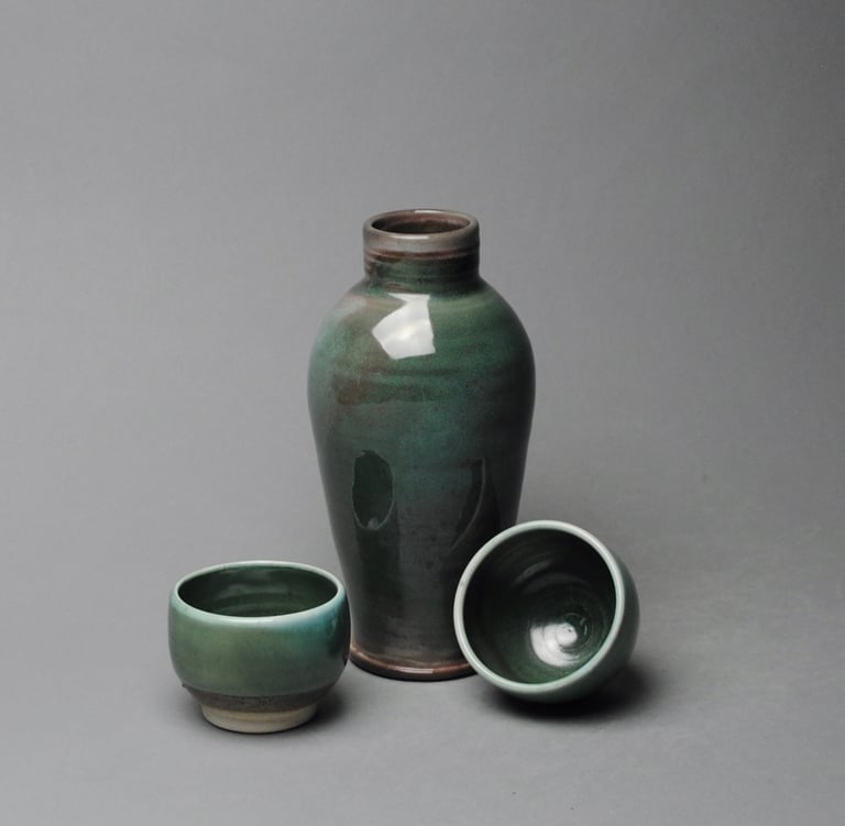 Sake bottle with two cups