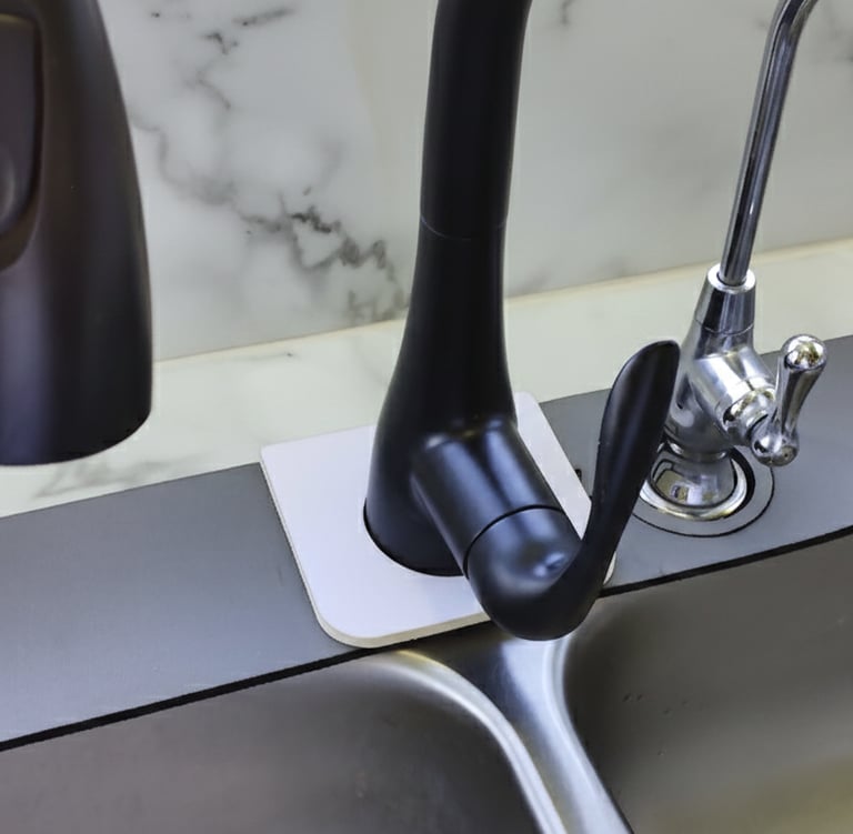 Sink Thingy Drip Ring on top of kitchen faucet mat.