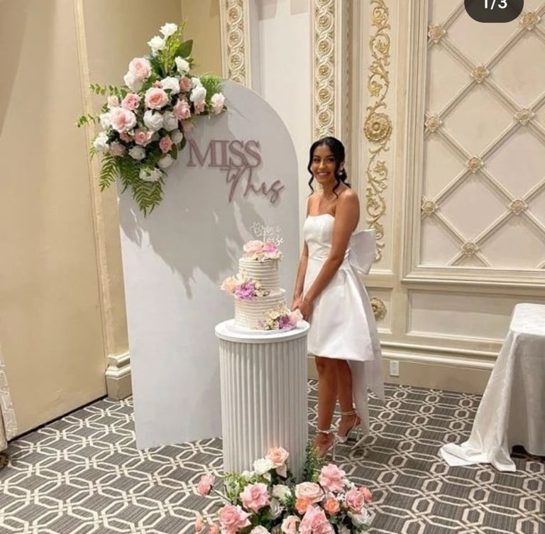 Bridal shower backdrop with a miss to mrs sign