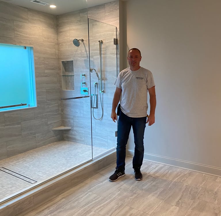 Large master bath featuring 5x14 walk-in shower designed for two. Build by WESHORN