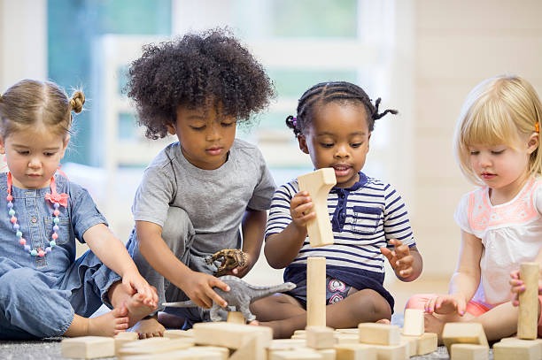 kids building with blocks