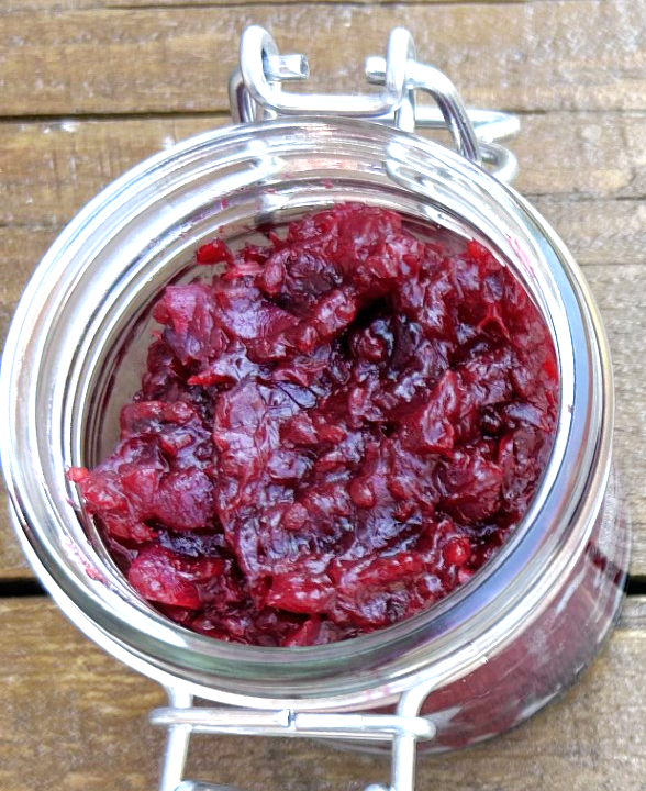 Jar containing red currant relish