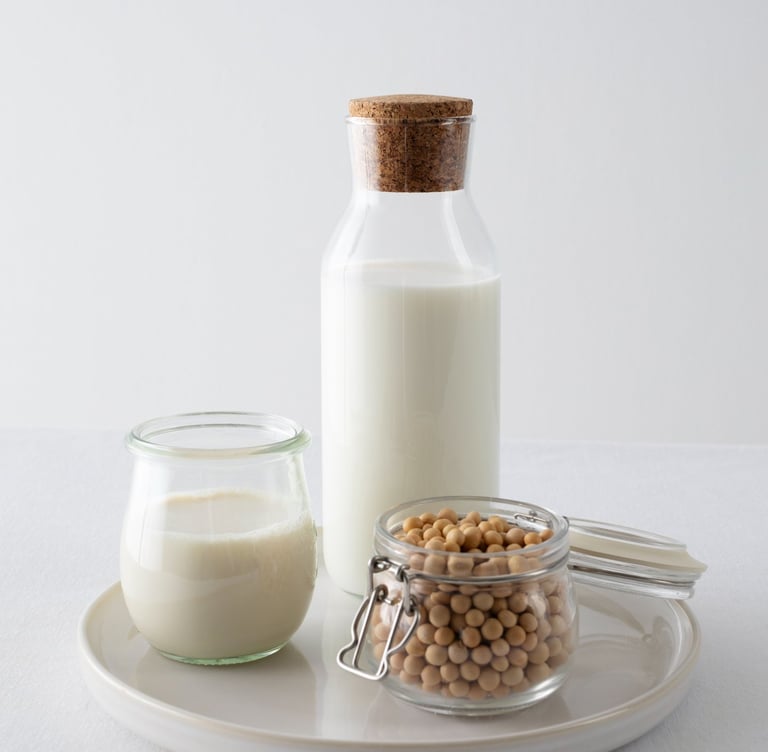 Image by <a href="https://www.freepik.com/free-photo/milk-day-concept-with-chickpeas-arrangement_265