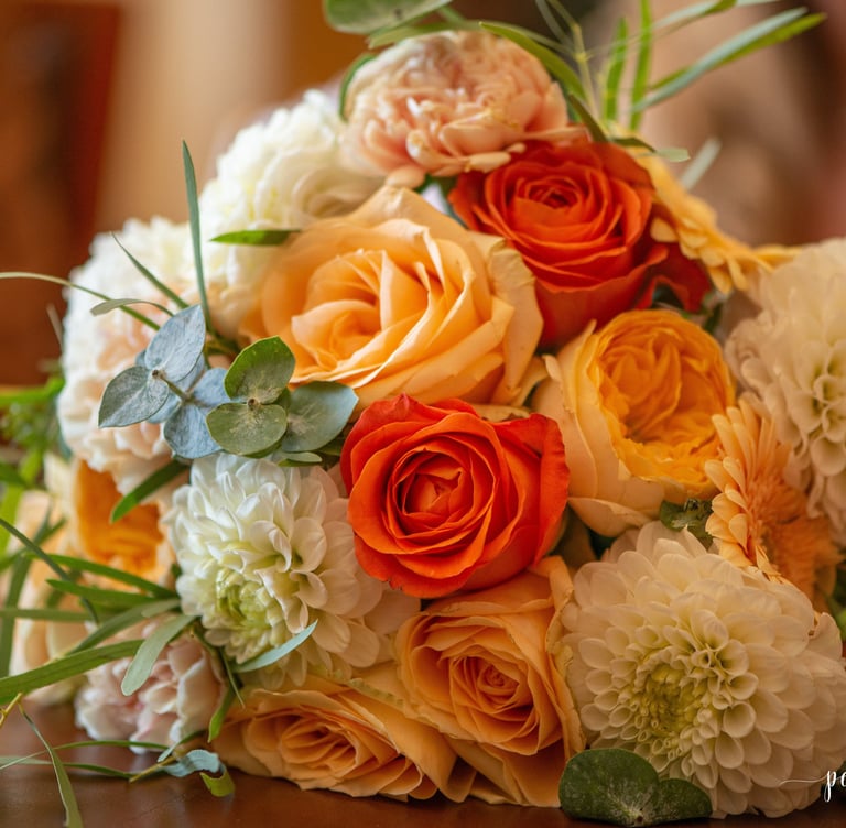 a bouquet of flowers on a table