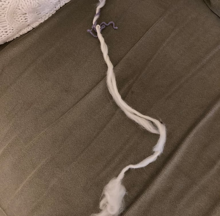 A beginner attempt at spinning wool 