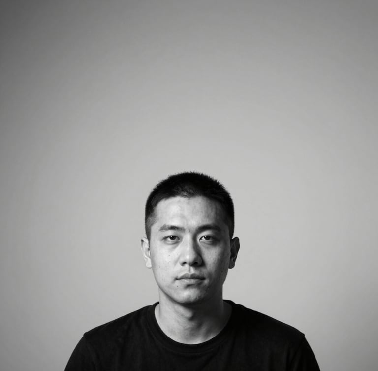 Stark minimalist black and white portrait of a creator, high-contrast direct studio lighting, orthographic framing, clean geometric composition, negative space.