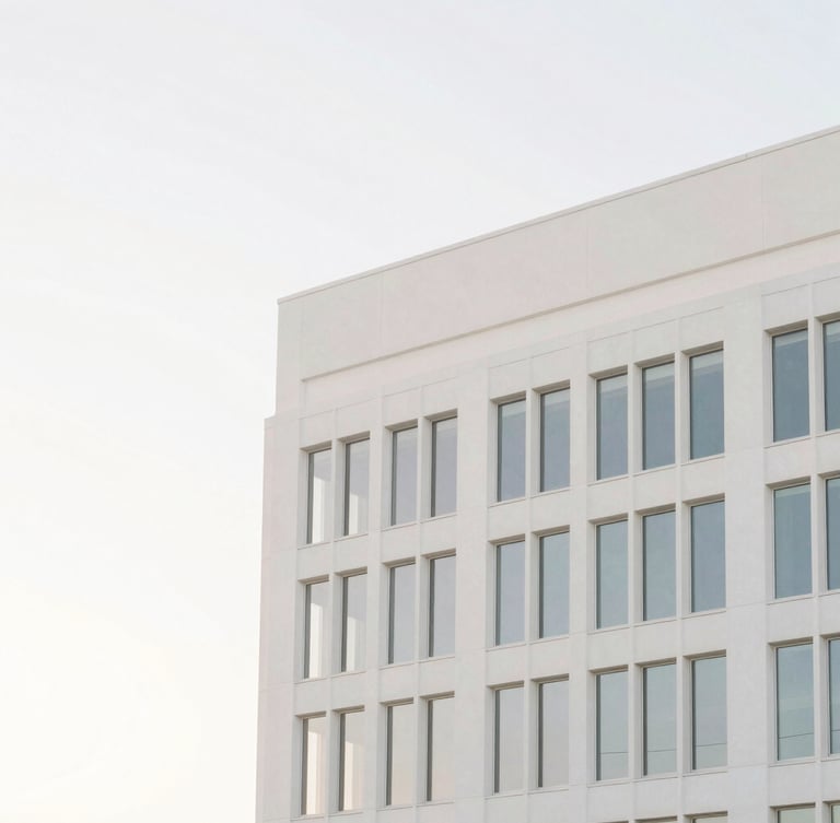 Minimalist architectural photography of a sun-drenched modern Orlando office building with clean lines, soft morning daylight, low-saturation pastel tones, crisp white background, high-key lighting, 35mm lens
