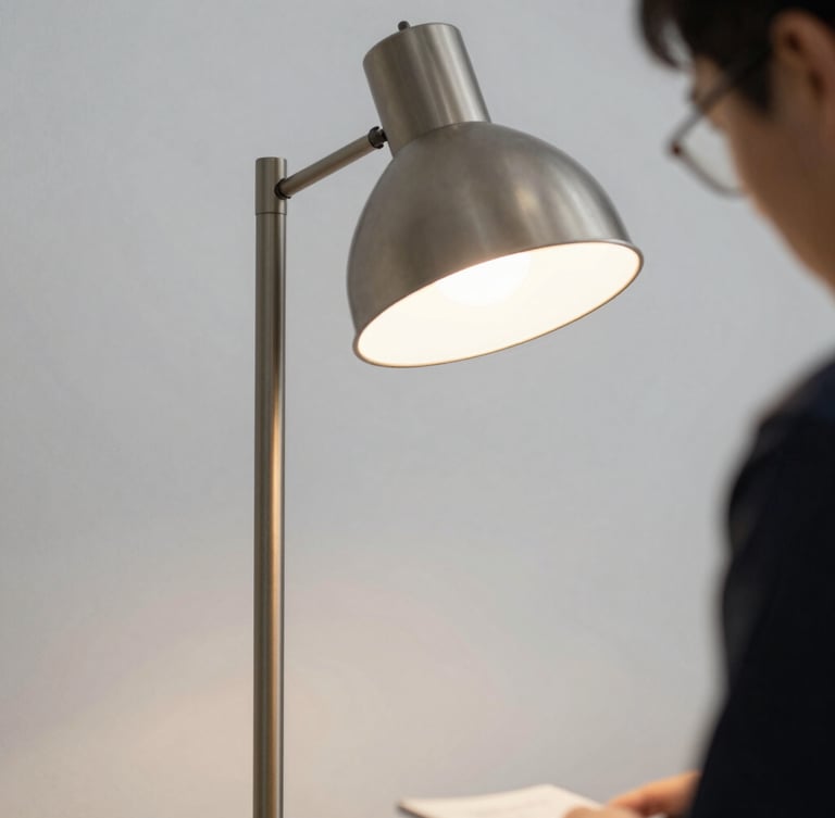 Close-up of a technician conducting safety testing on a minimalist metal floor lamp, crisp architectural lighting, 35mm