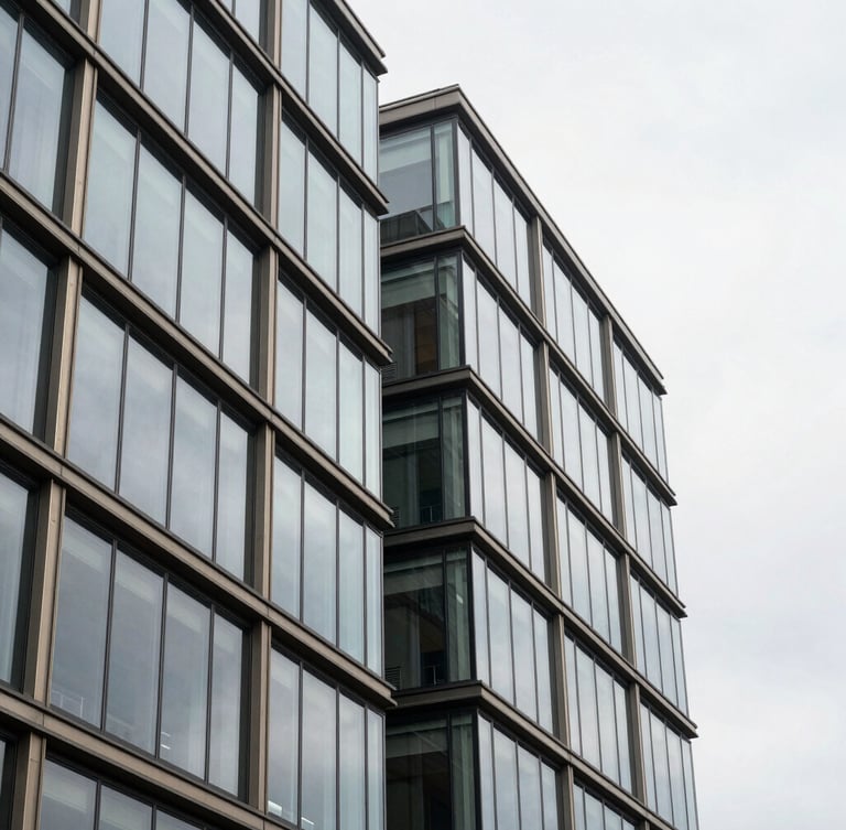 Architectural close-up of a modern glass and steel financial building in Luxembourg, sharp geometric lines, soft overcast daylight, elegant composition, 35mm lens