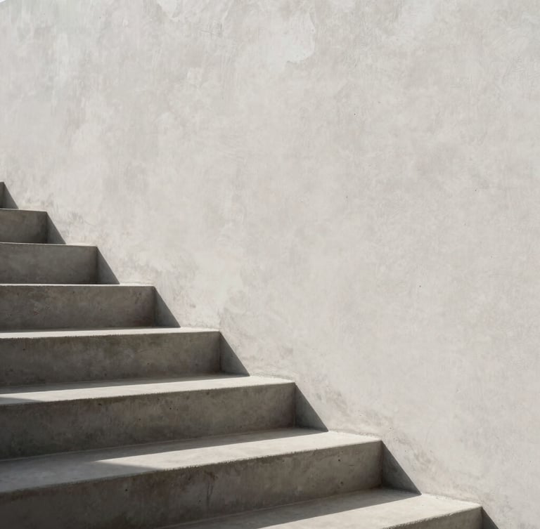 Architectural detail of concrete stairs meeting a smooth plaster wall, sharp shadows from afternoon sun, minimalist luxury aesthetic