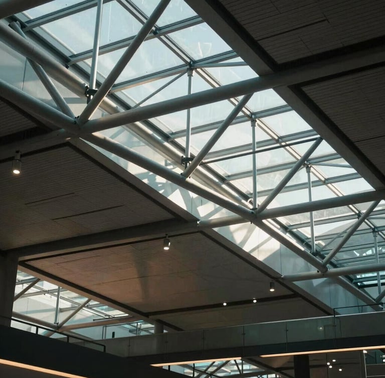 Dramatic high-contrast architectural shot of a modern airport terminal ceiling, steel trusses, cool daylight pouring through glass, cinematic 35mm.